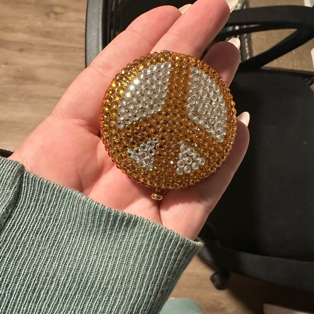 Vintage Estée Lauder peace sign compact